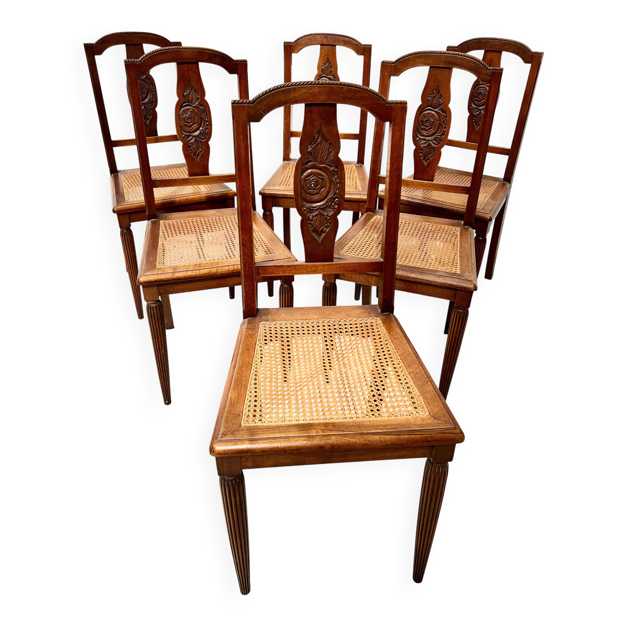 Set of six Art Deco chairs in solid walnut, 20th century.