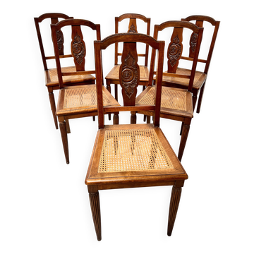 Set of six Art Deco chairs in solid walnut, 20th century.