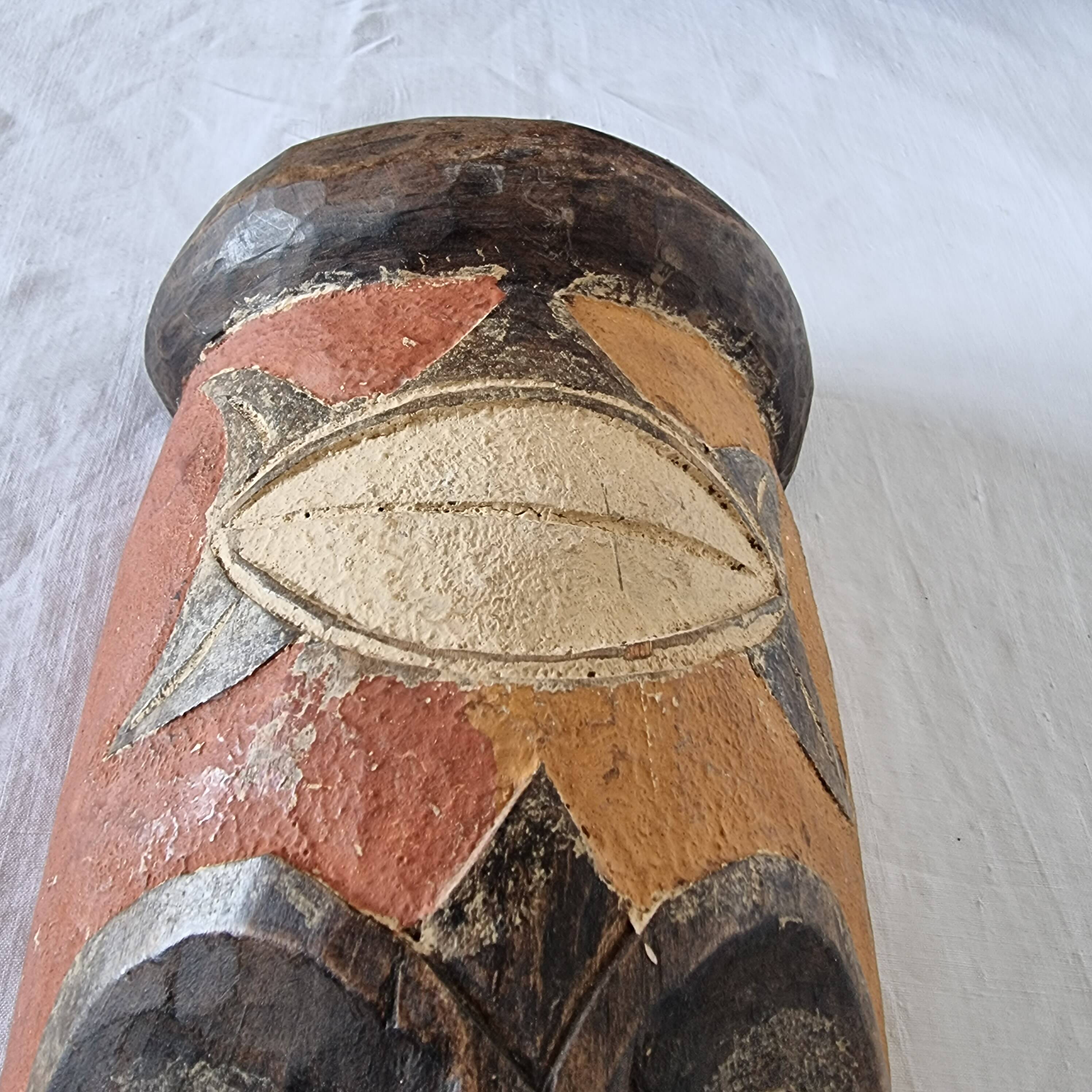 Wooden mask baule carved and hand painted with natural pigments from ivory coast