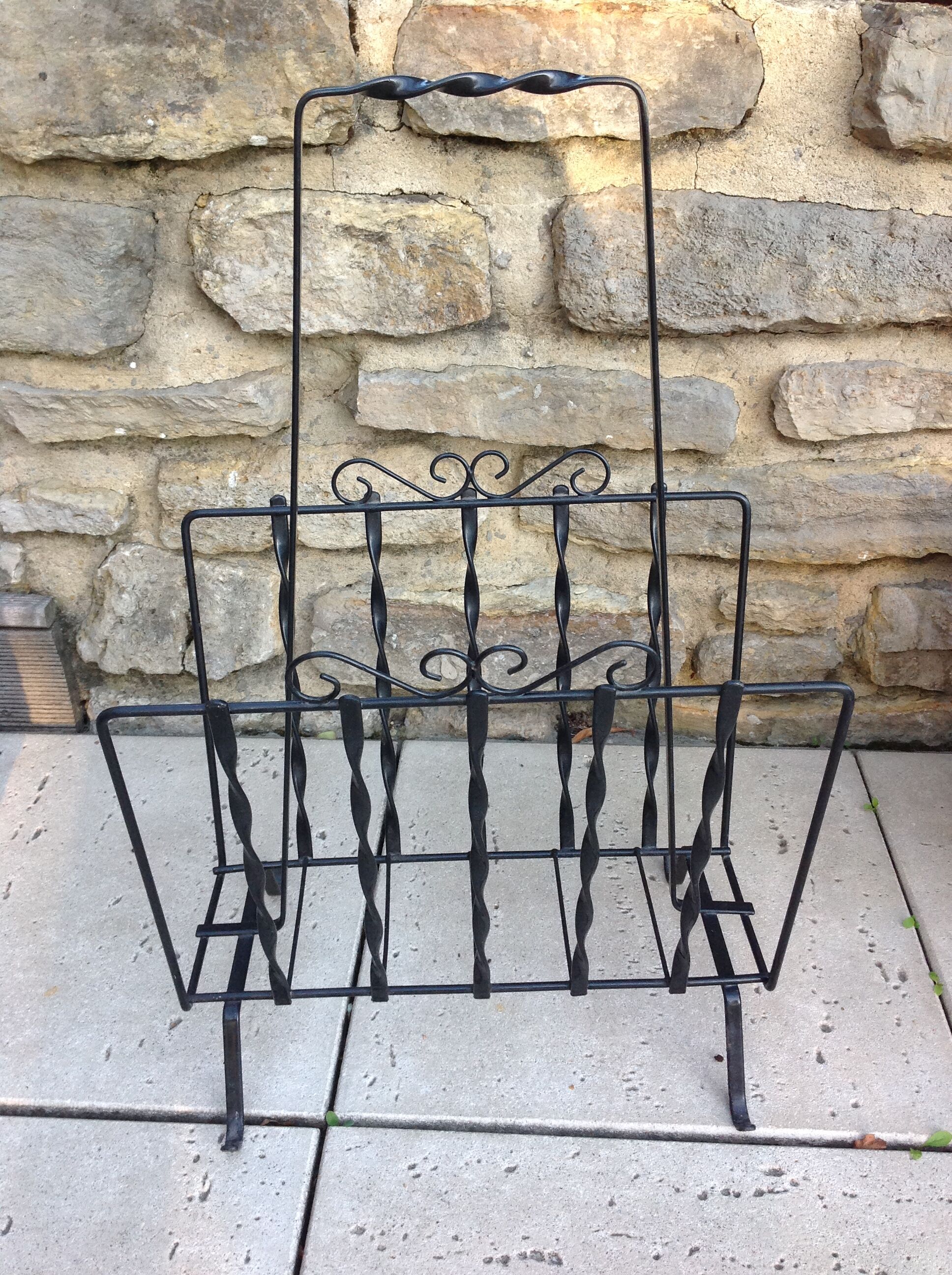 Black metal magazine holder