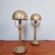 Pair of table lamps in bronze and brass, early 20th century.