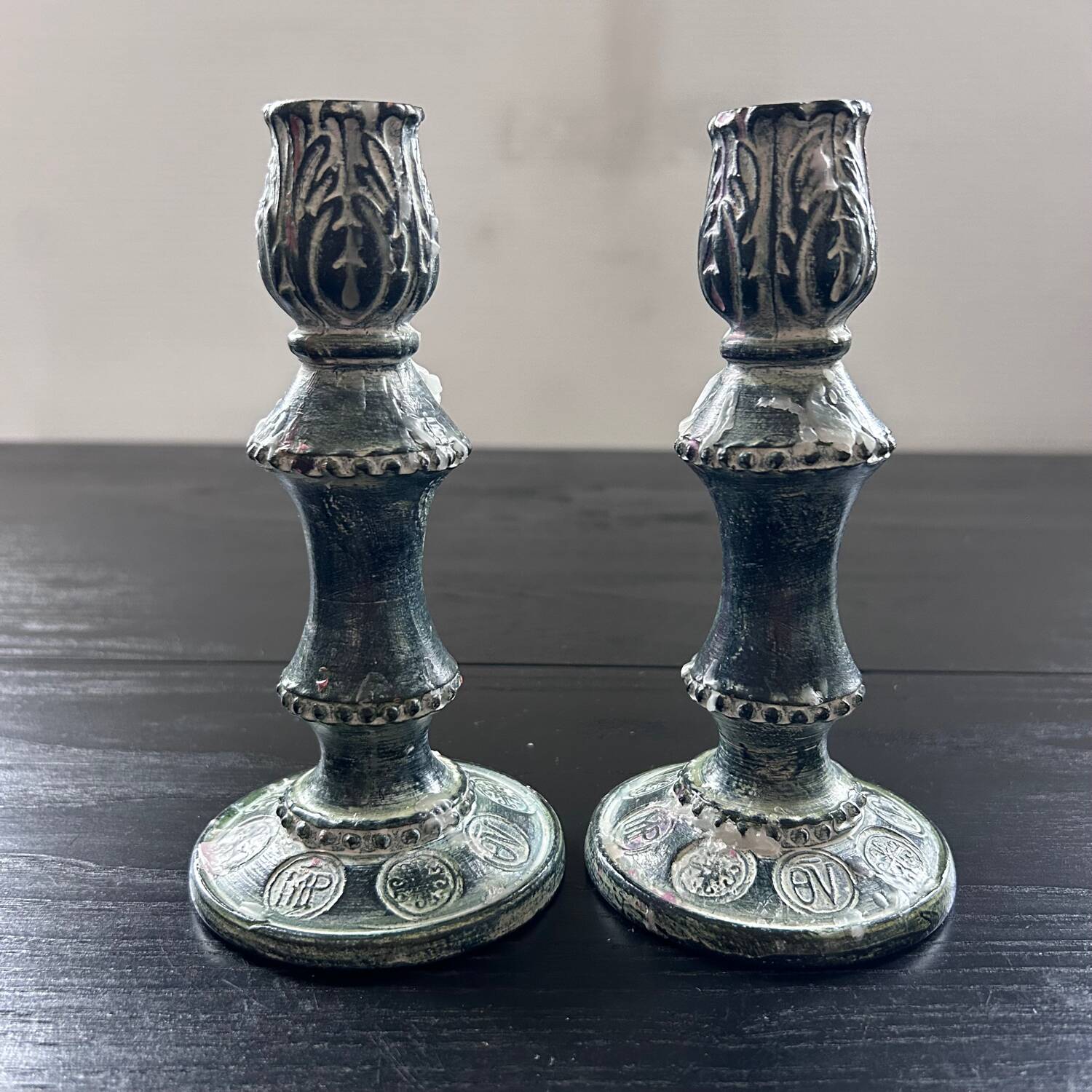 Pair of green ceramic candlesticks