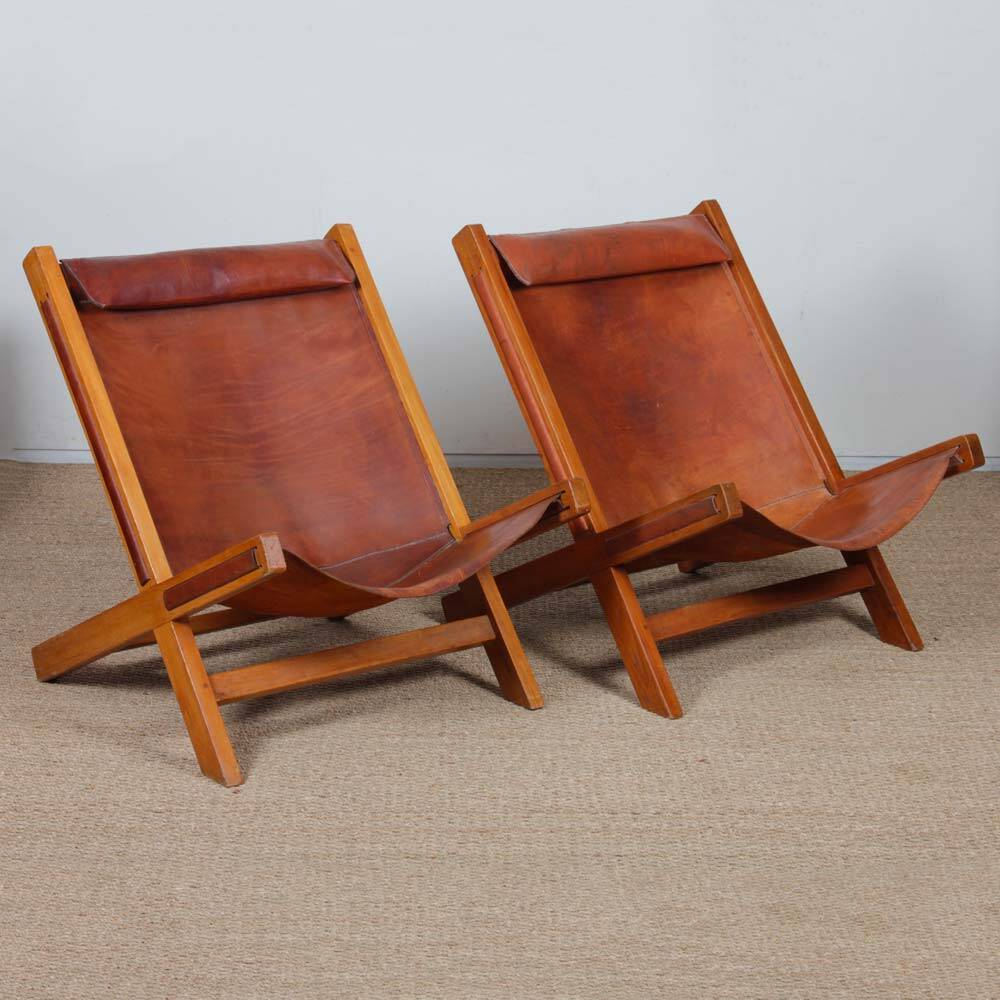Pair of large wooden and leather armchairs from the 1980s