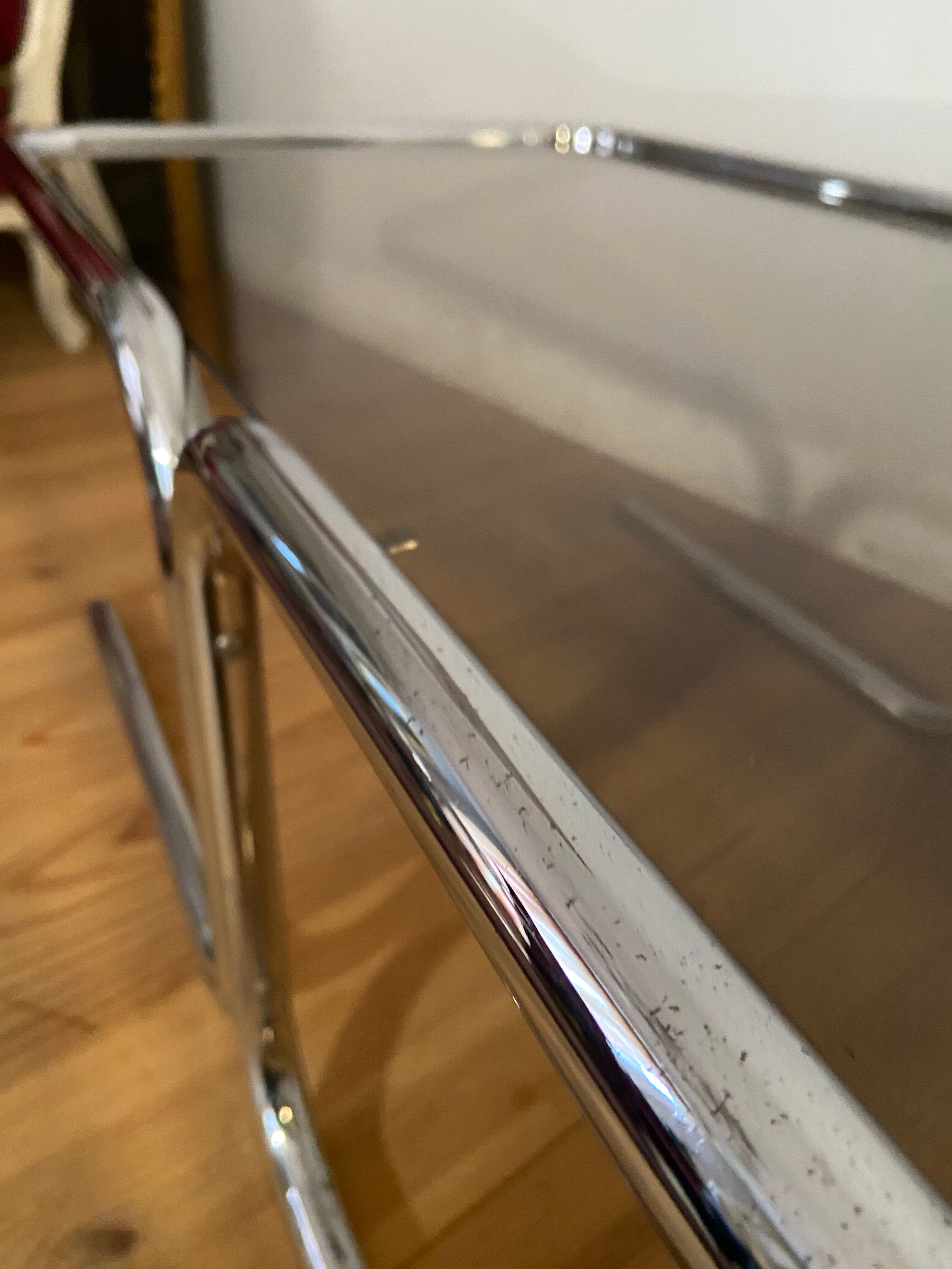 Vintage coffee table in chrome and smoked glass 70s