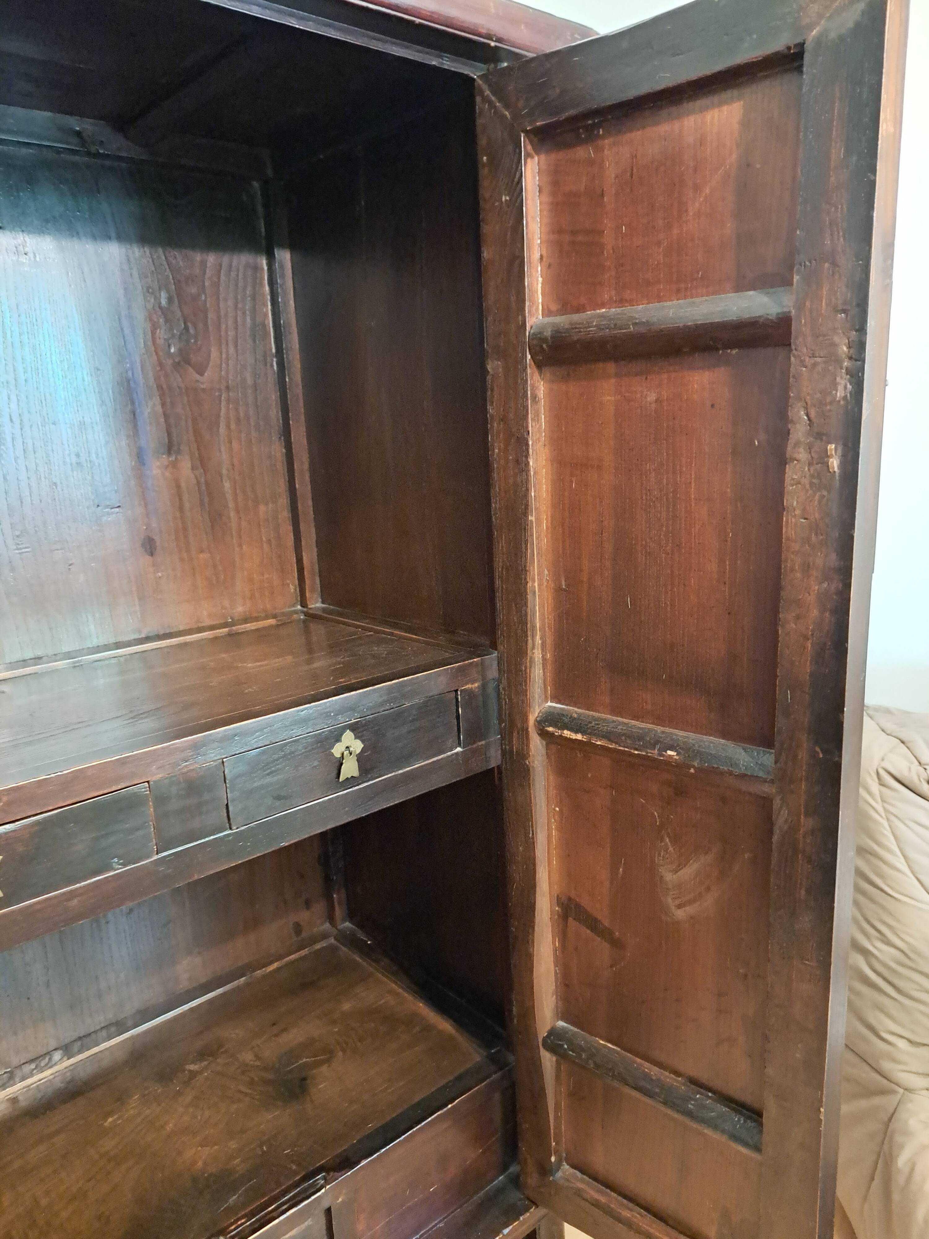 Brown lacquered Chinese wardrobe from Shandong.