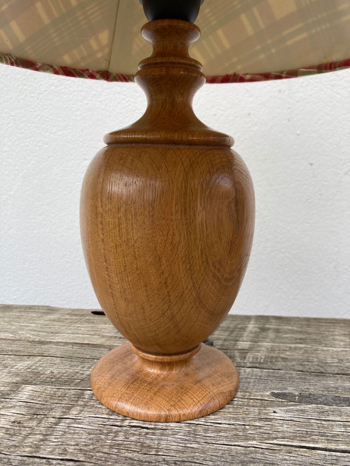 Wooden lamp and vintage red and green striped lampshade