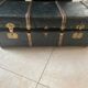 Old trunk in zinc/wood and brass