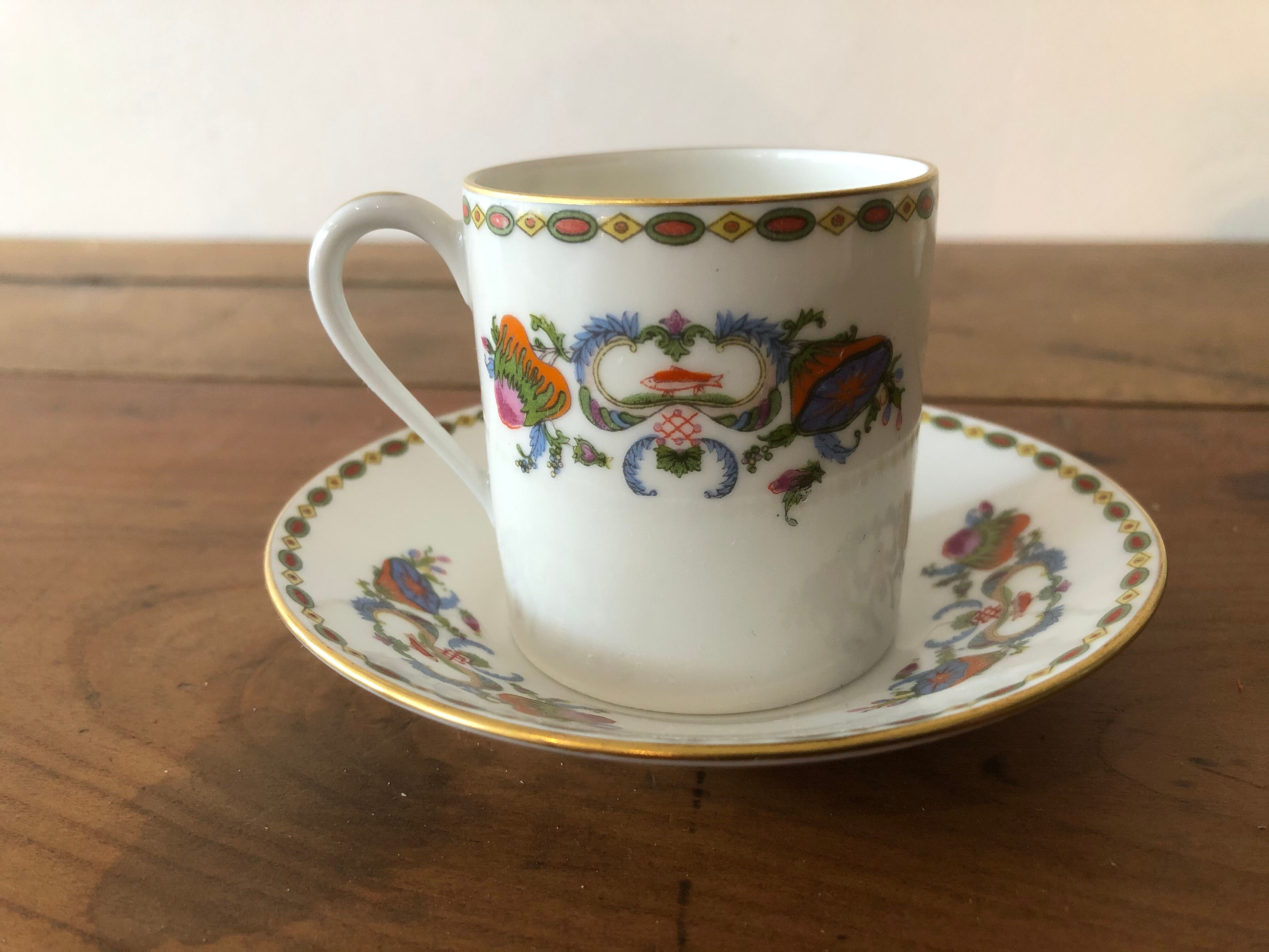 Service of 12 porcelain coffee cups, Raynaud, Limoges, 1950s.
