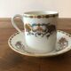 Service of 12 porcelain coffee cups, Raynaud, Limoges, 1950s.