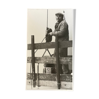 Photograph black and white silver print circa 1970 worker