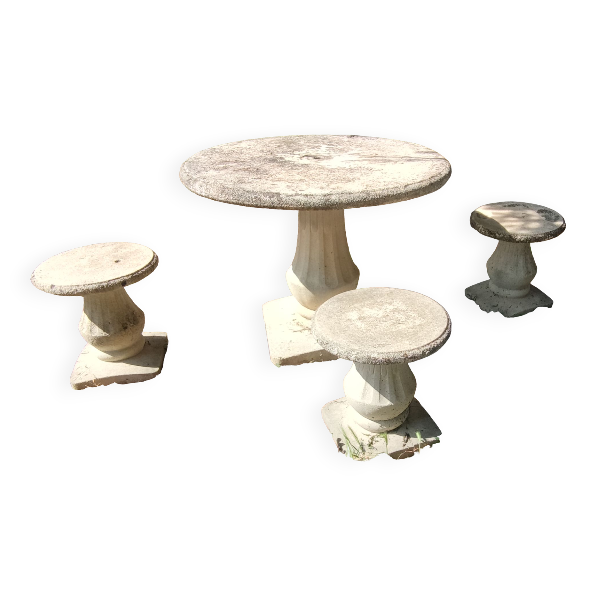 Old garden furniture in reconstituted stone