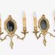 Pair of Louis XV style beveled mirror sconces in bronze by Lucien Gau