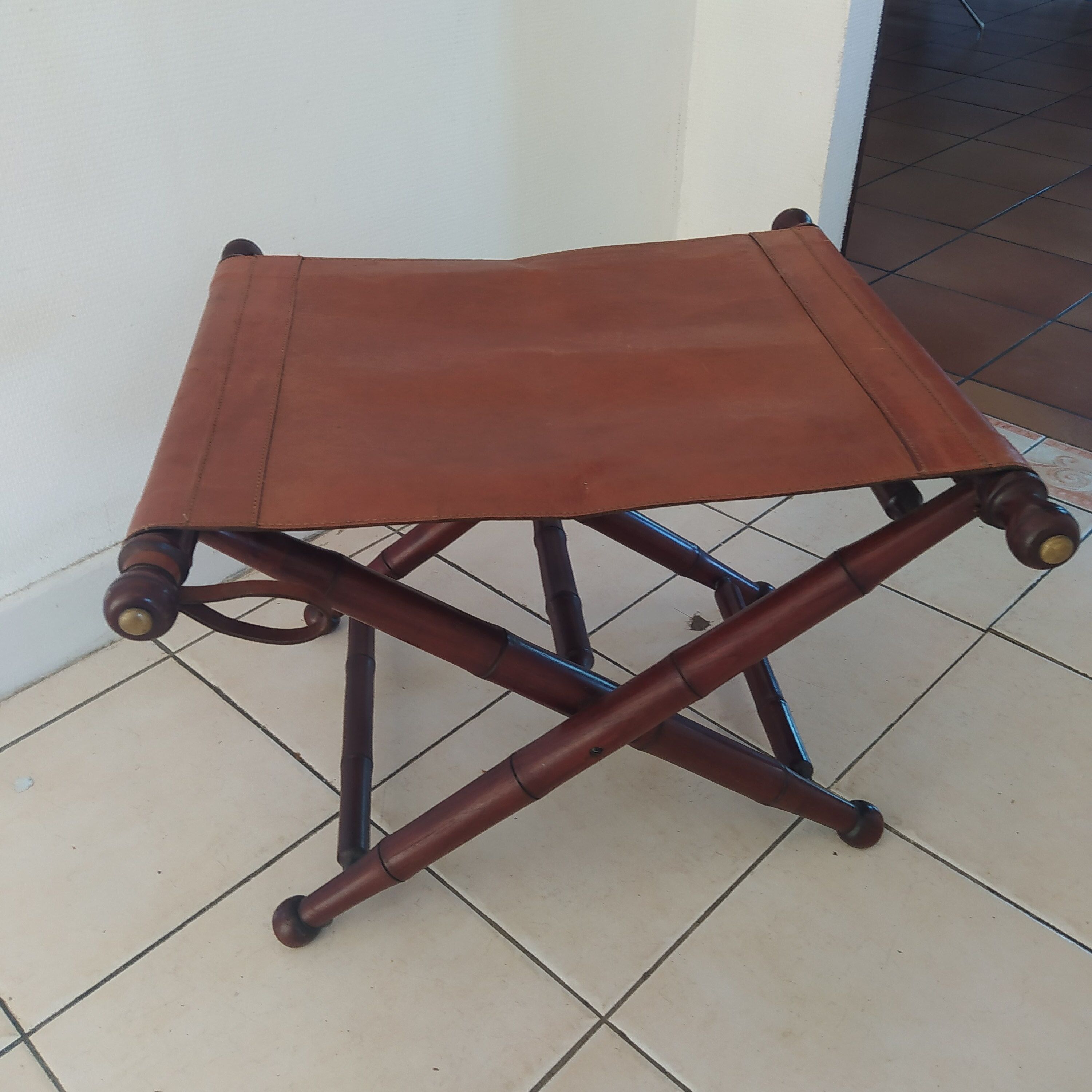 Vintage foldable leather and mahogany stool