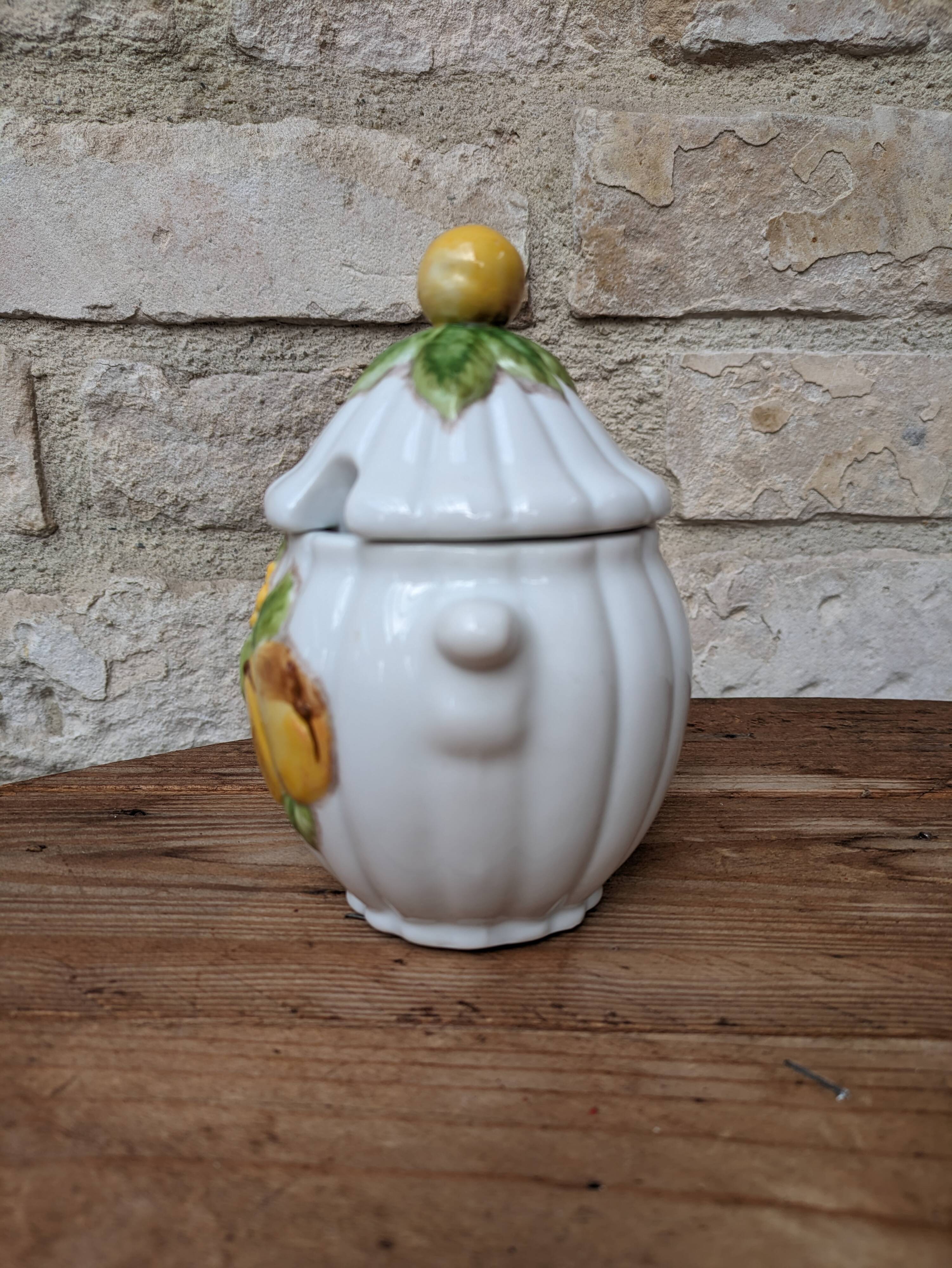 Old ceramic sugar bowl with yellow fruit motif