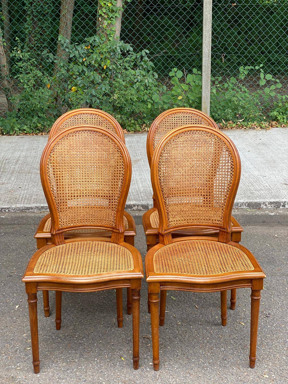 4 caned Louis XVI medallion dining chairs from the 1960s.