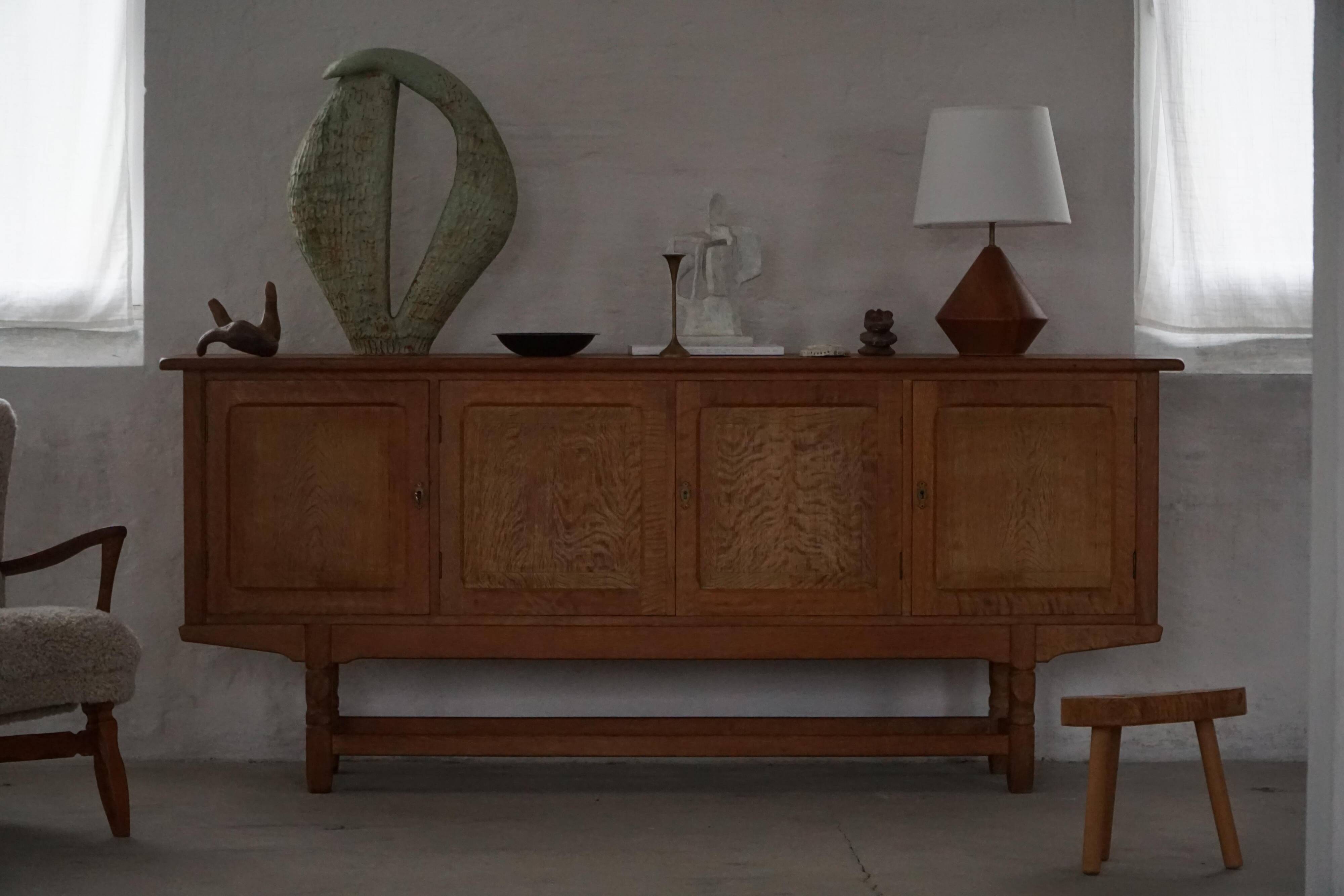 Low oak sideboard, mid-century modern, made by a Danish cabinetmaker, 1960s.