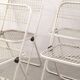 Four Talin Spa metal mesh chairs from the 1980s.