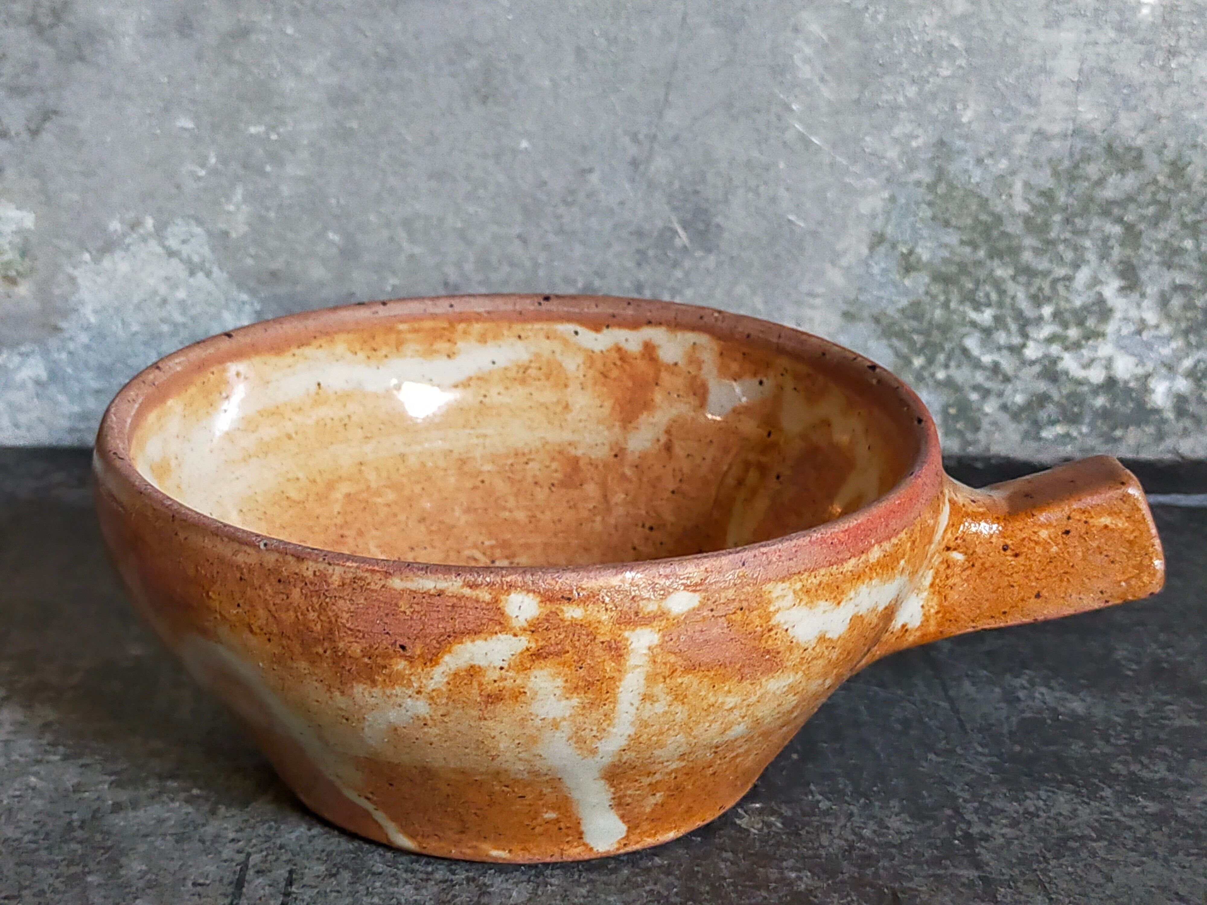 Three vintage marais sandstone bowls