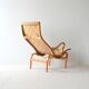 “Pernilla” armchair and footstool designed by Bruno Mathsson