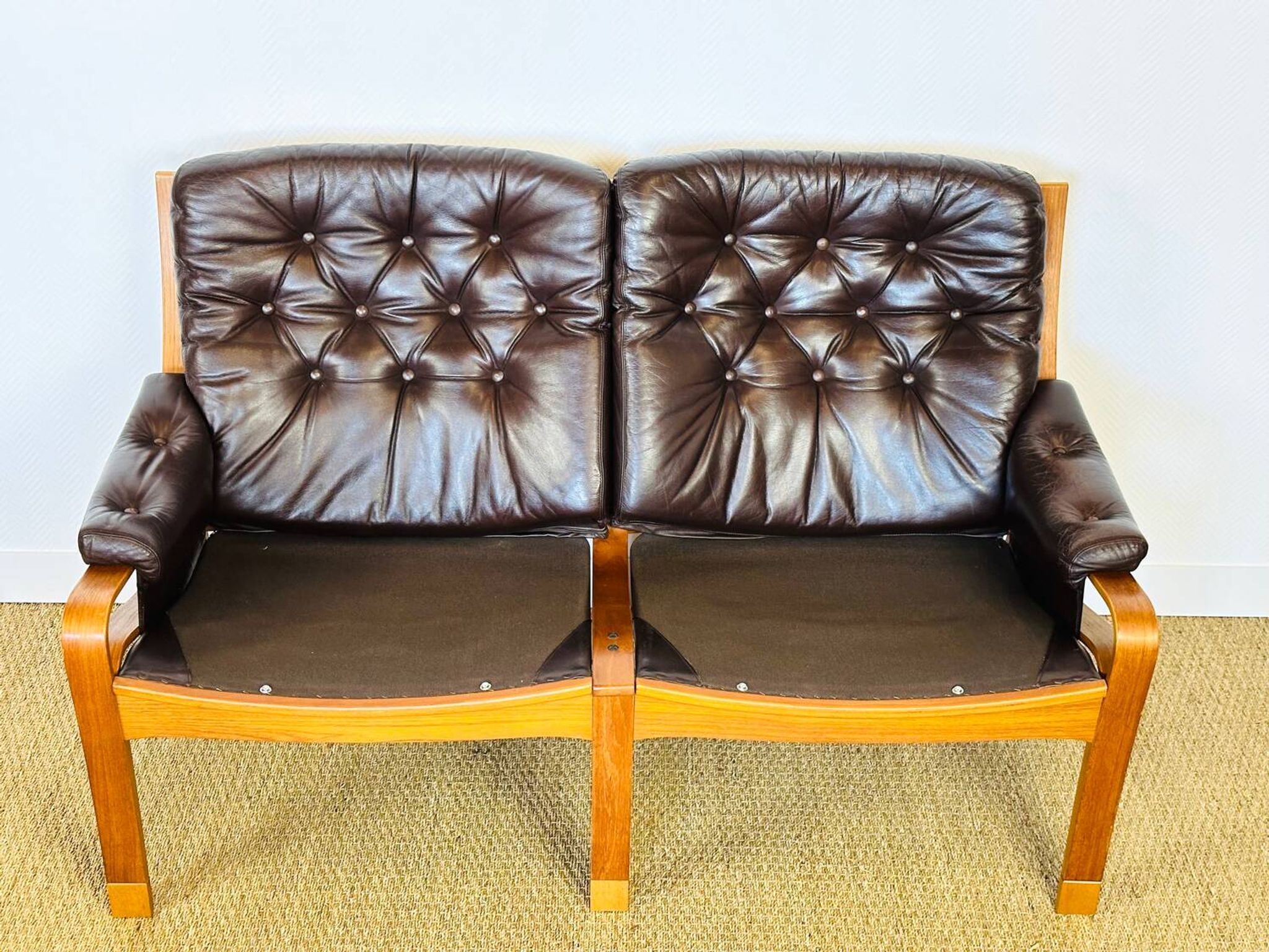 Scandinavian leather and teak bench from the 1960s.