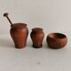 Small, beautiful lot consisting of a salt cellar, pepper shaker and honey jar.