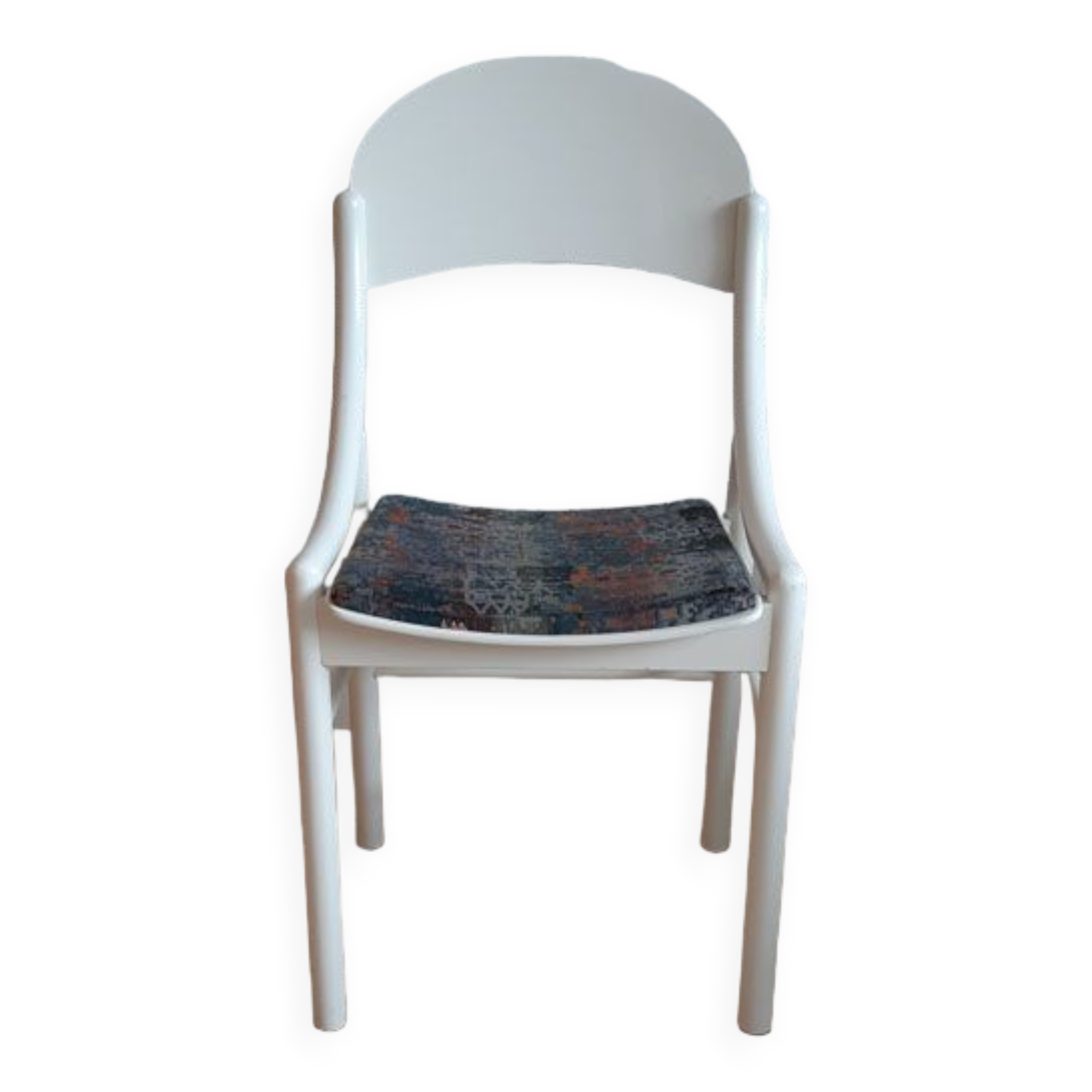White Baumann chair.