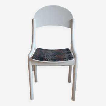 White Baumann chair.