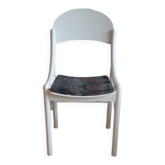 White Baumann chair.