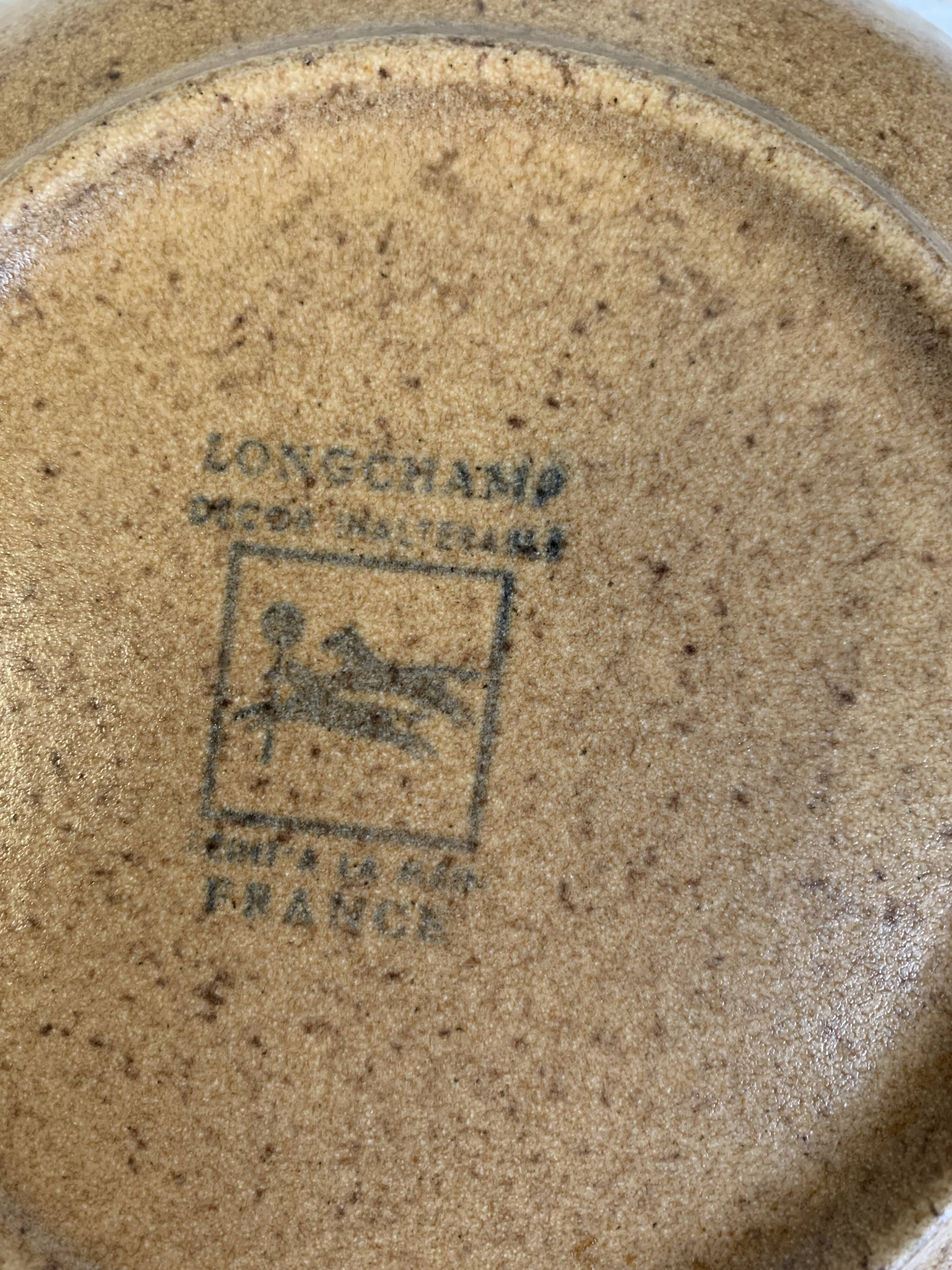 6 Longchamp brown enameled stoneware soup plates, 1970s