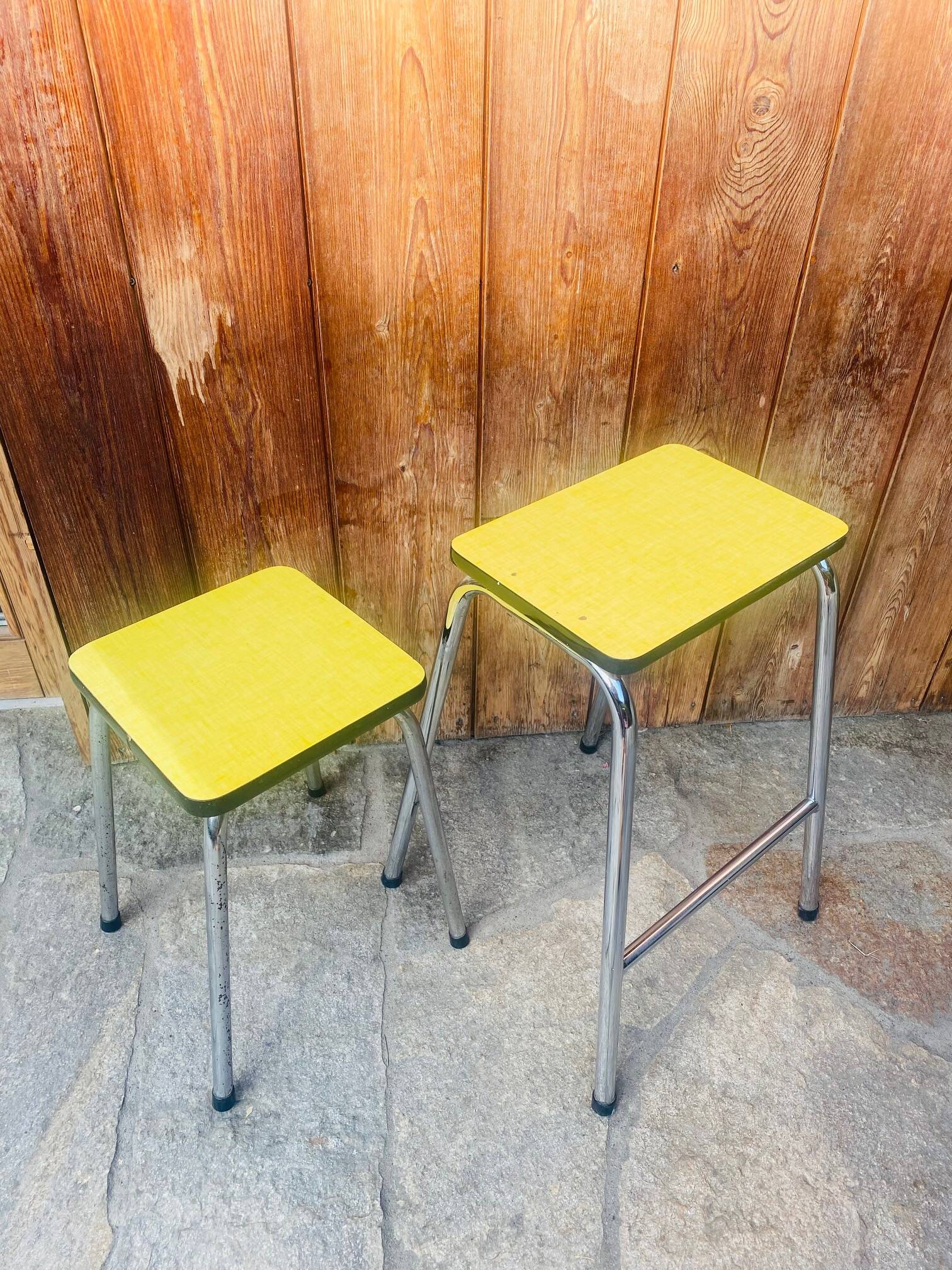 Set of 2 yellow Formica stools
