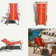 Vintage deck chair with red and orange striped fabric, original patina.