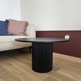 oval black fluted coffee table