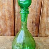 Biot carafe in green bubble glass