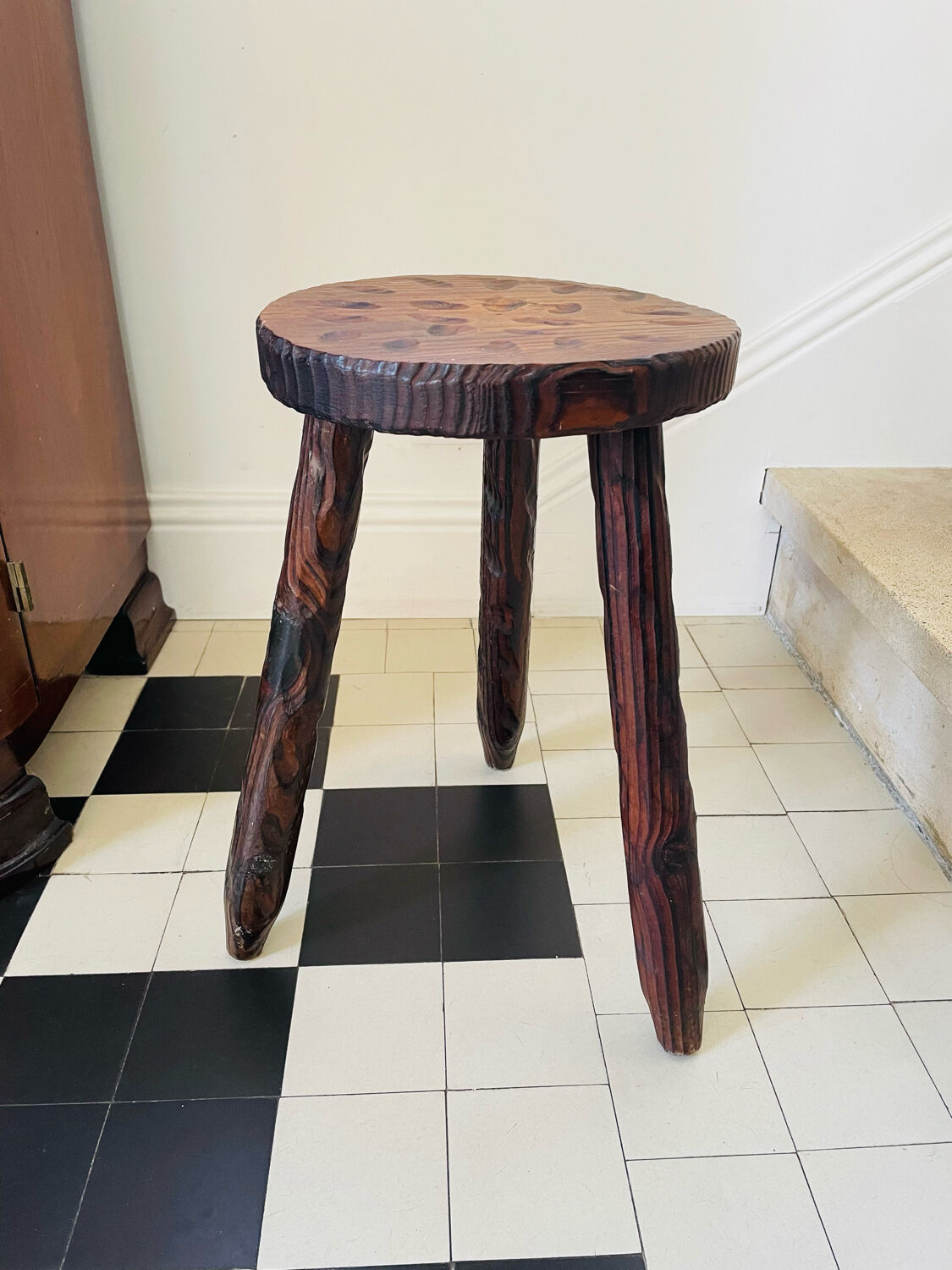 Dark wood tripod stool