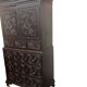 Antique tall wardrobe in dark carved wood / bohemian wardrobe