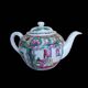 Canton porcelain tea service with 6 cups and teapot.