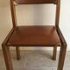 Chaise cuir et bois 70’s