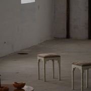 A pair of antique Danish stools, seats in lambswool, late 19th century.