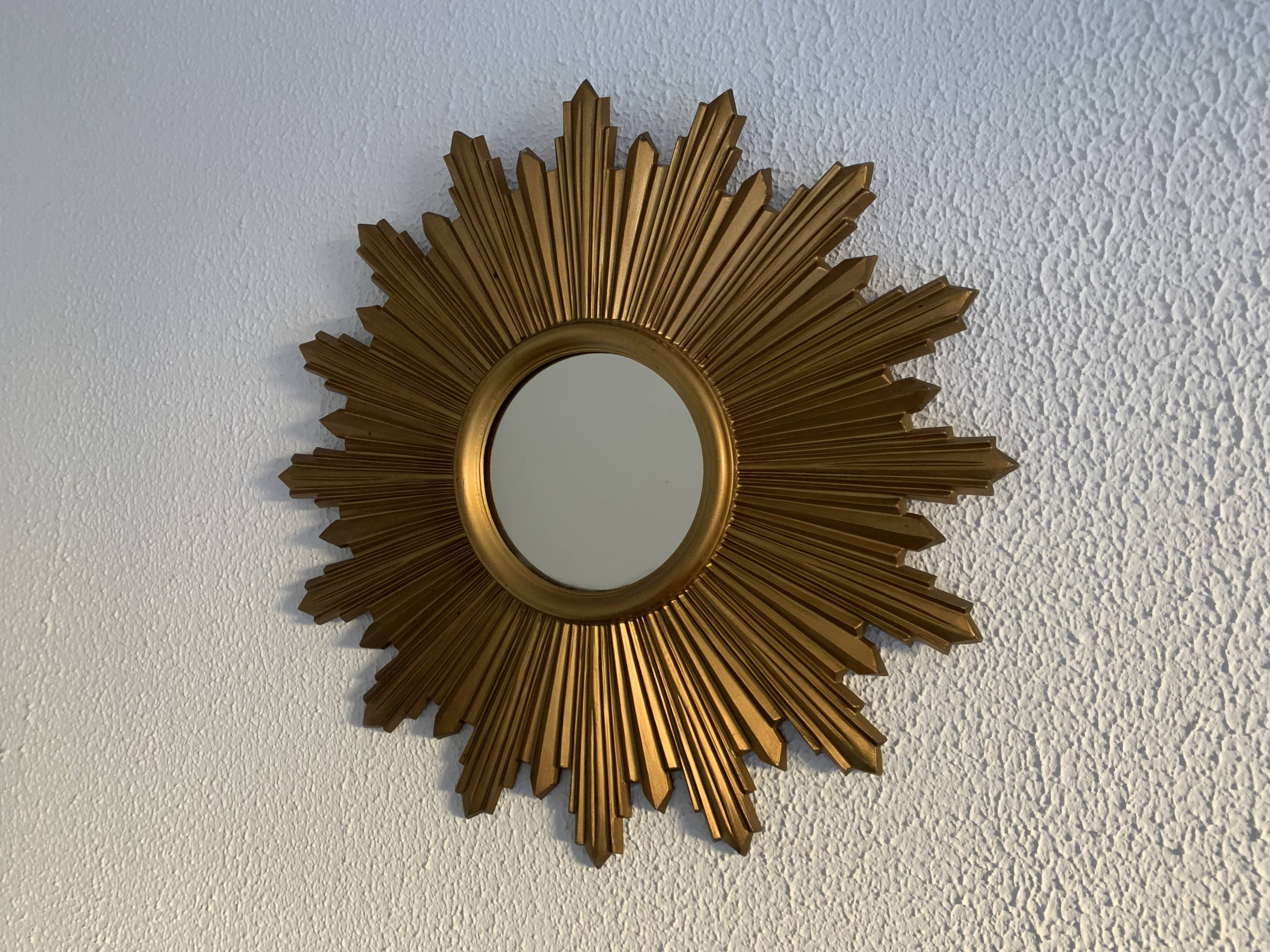 Vintage 1970s gold plastic sun mirror - 44 cm