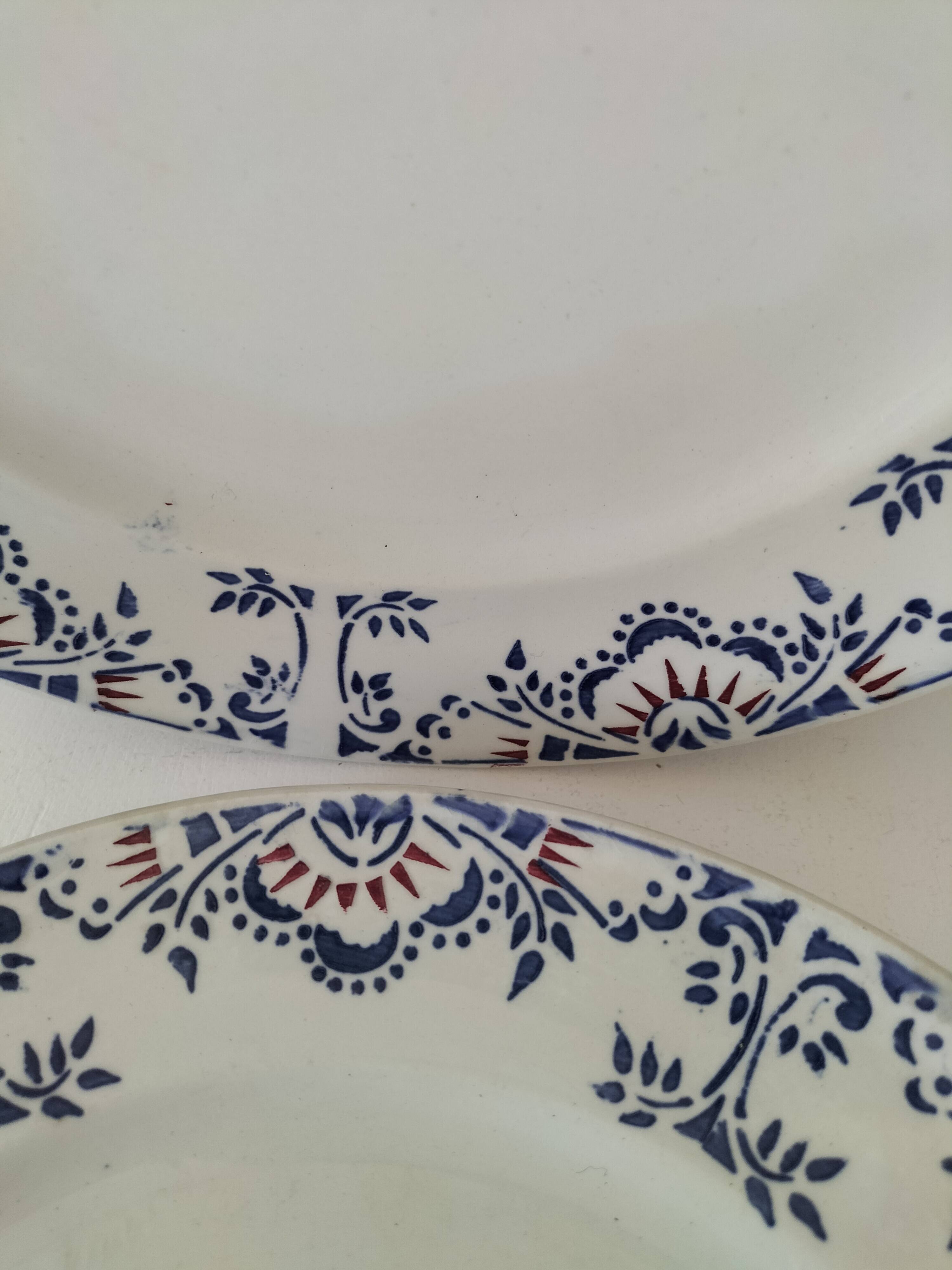 Pair of ironstone plates from Onnaing – blue and red decoration, 19th century