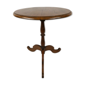 Round pedestal table in fruit wood
