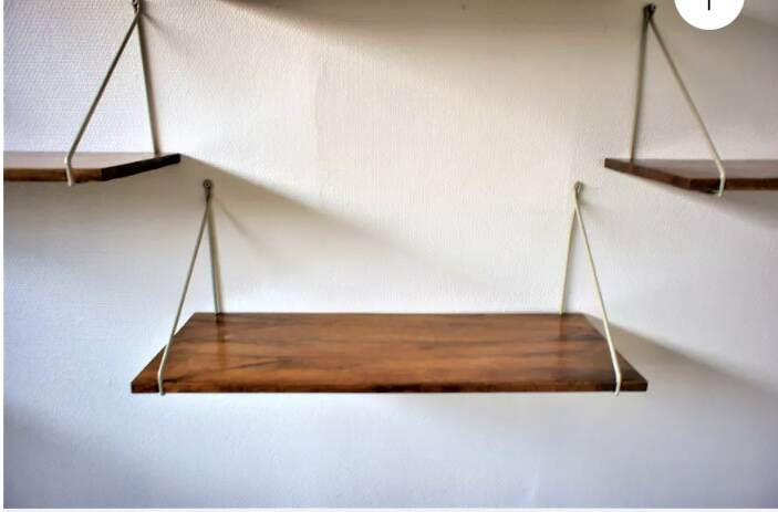 Modular wall shelves in exotic wood
