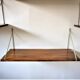 Modular wall shelves in exotic wood