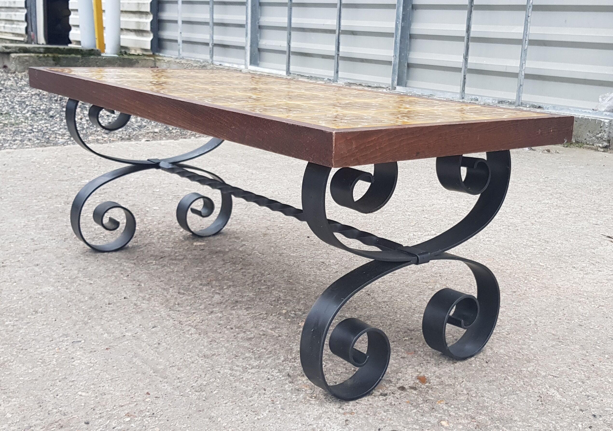 Antique vintage coffee table with glazed earthenware top