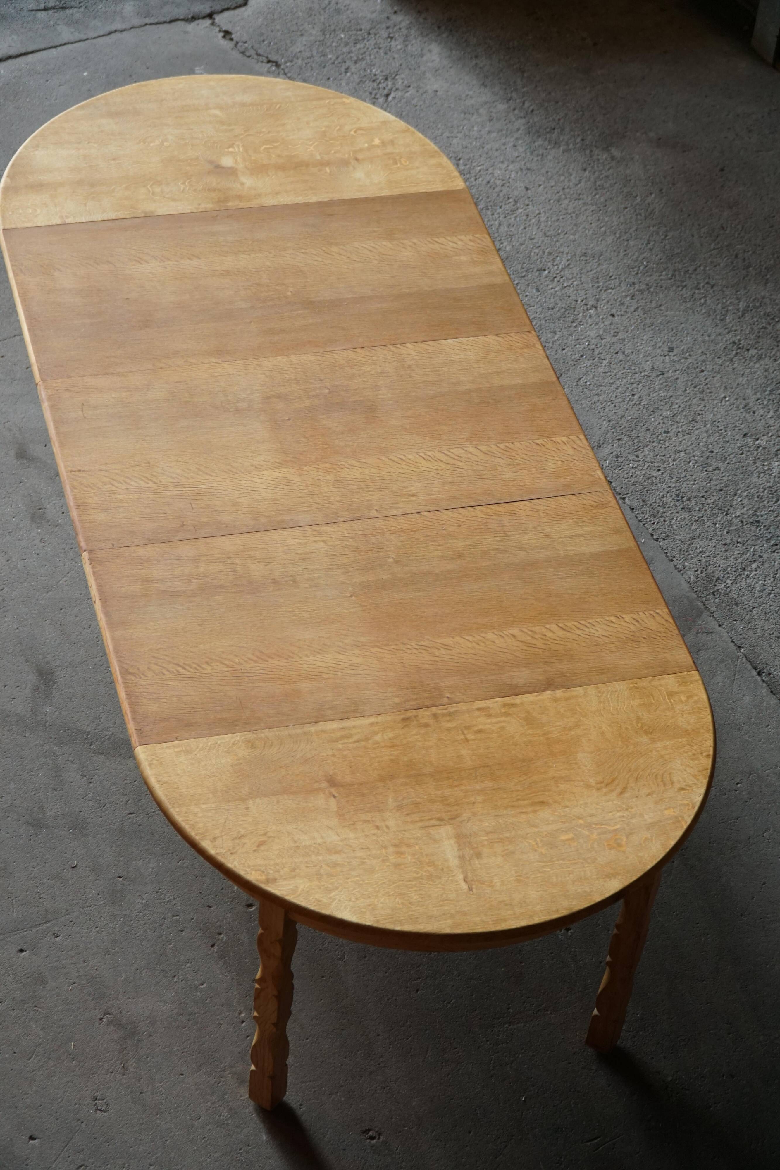 Mid-century round oak dining table with three extensions, Danish modern, 1960s.