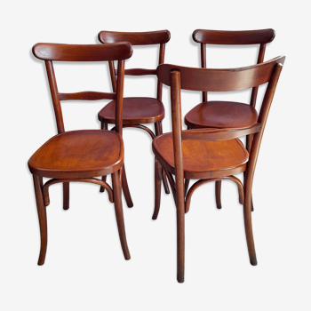 Suite of 4 bistro chairs, published by fischel
