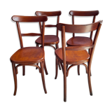 Suite of 4 bistro chairs, published by fischel