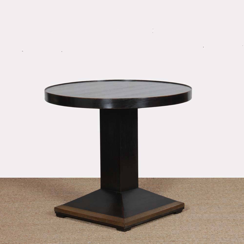 Round high wooden table, early 20th century craftsmanship.