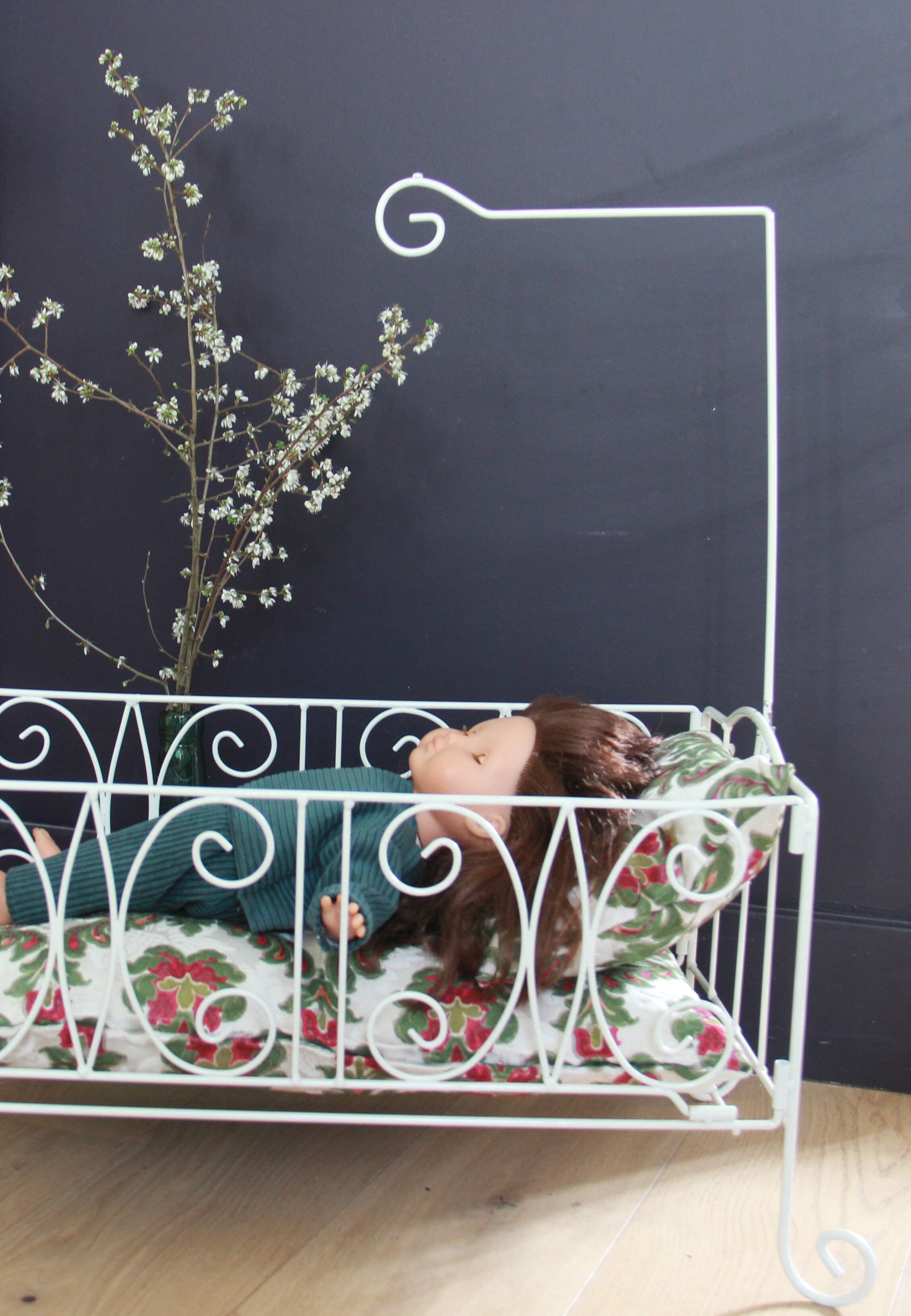Wrought iron doll bed