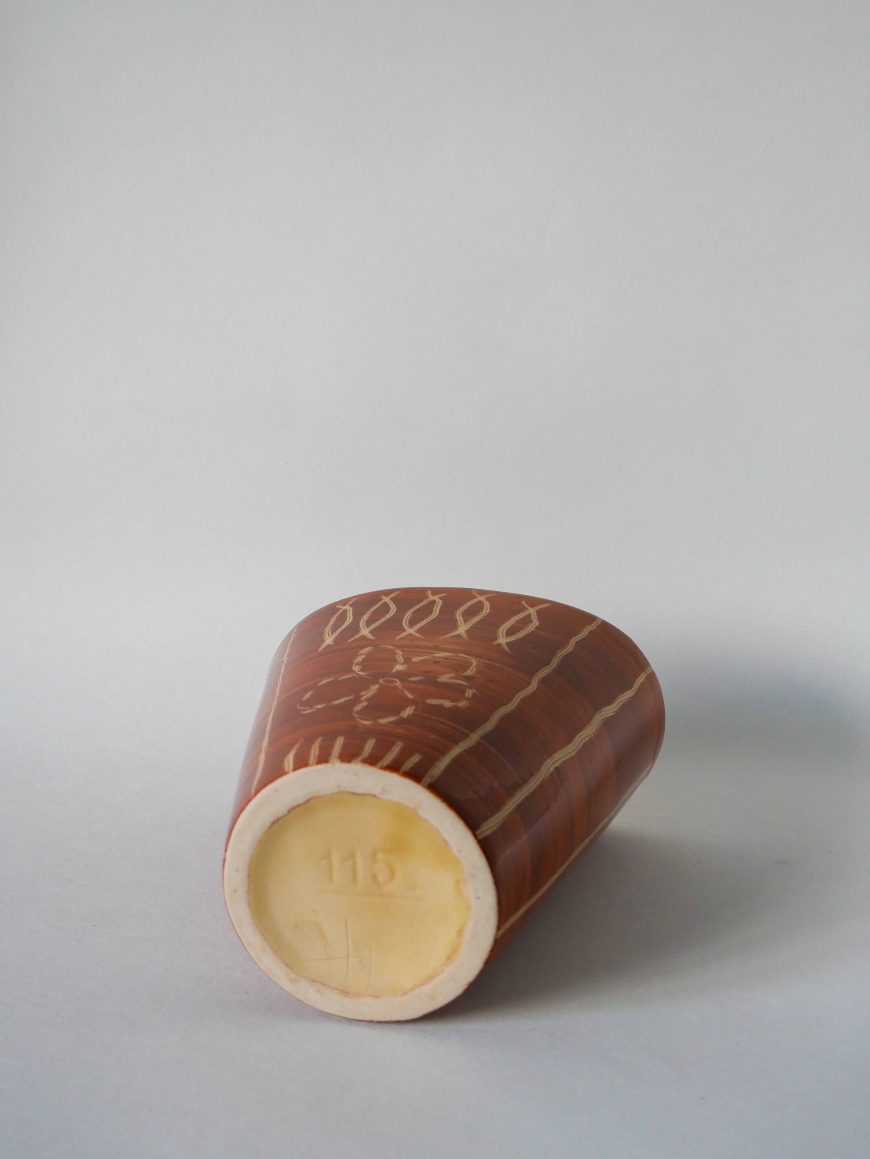 Patterned beige and brown ceramic vase, numbered 1970